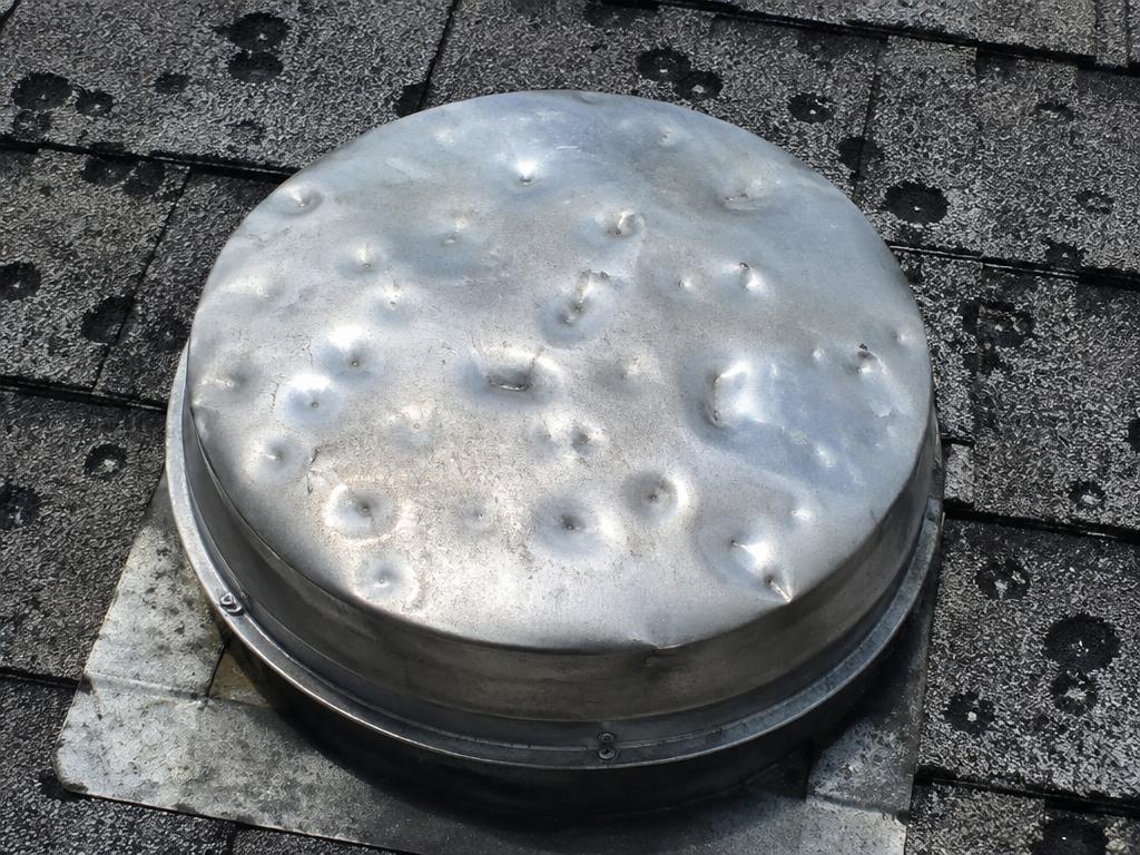 Hail dents on soft metal
