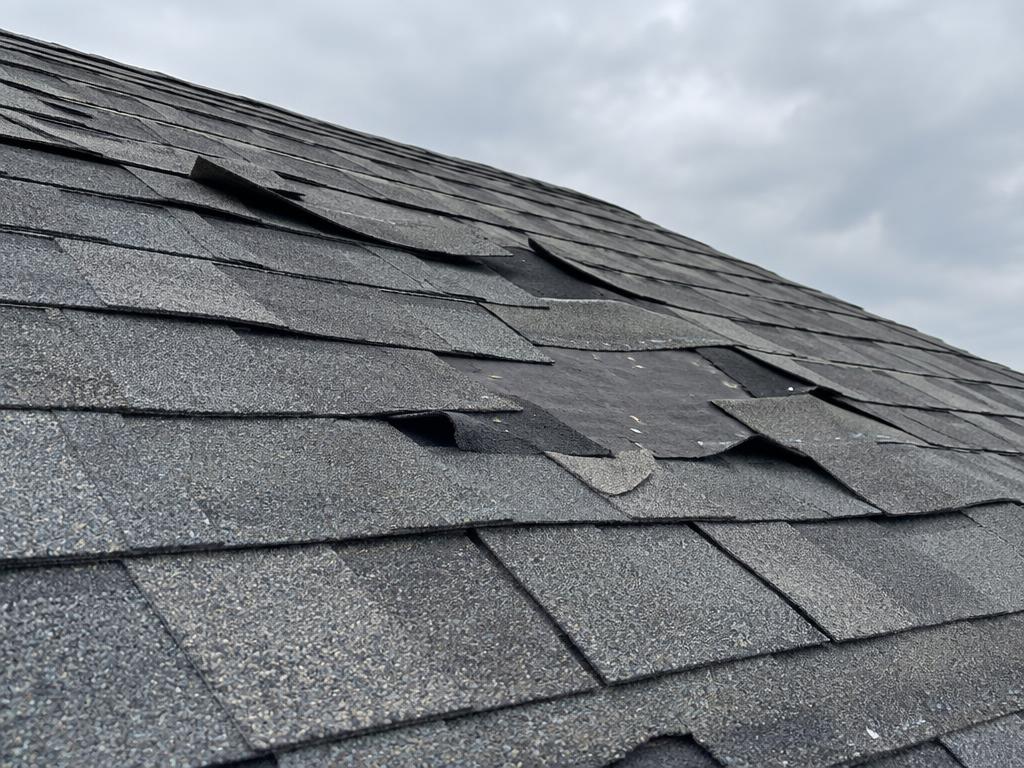 Wind-lifted shingles