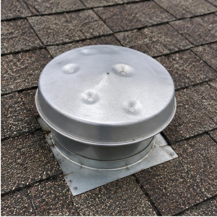 Dented metal vent cap