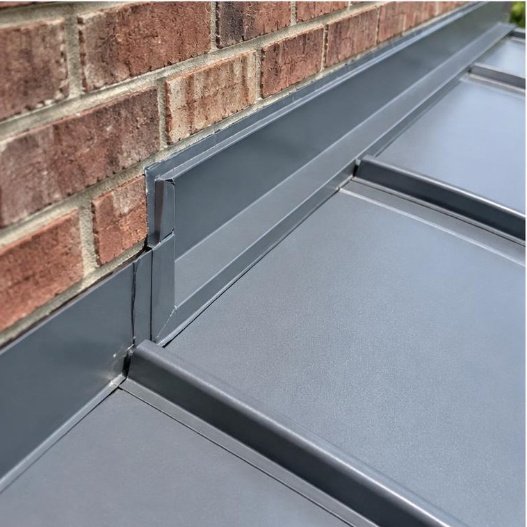 Roof-to-wall metal flashing
