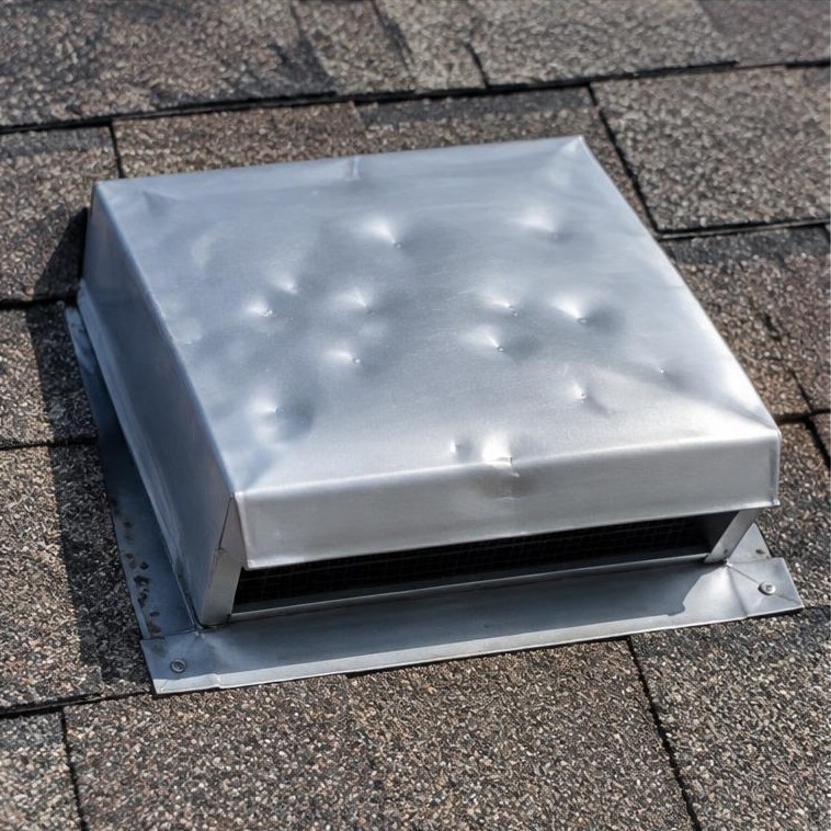 Dented metal roof vent