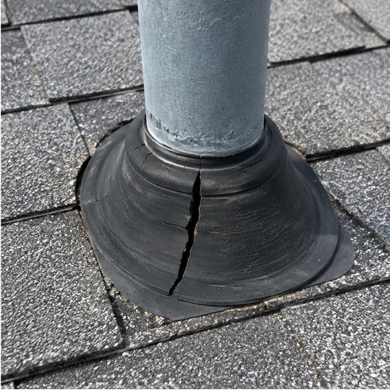 Wind-lifted shingles on a roof